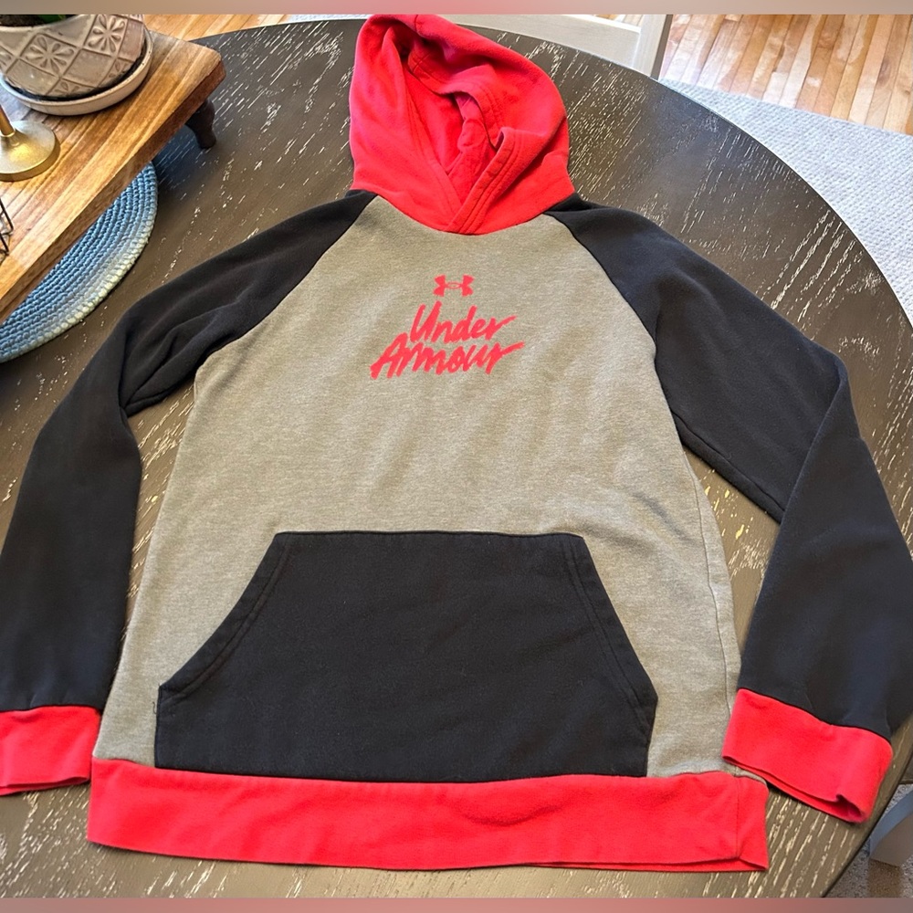 Very unique worn in, comfy hoodie size kids Large.  Gray/Red/Black in color.